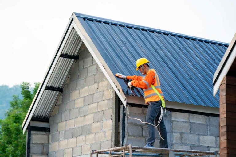 man fixing roof